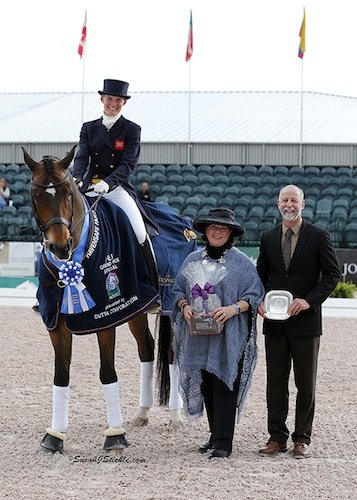 Lara Griffth and Rubin Al Assad with Betsy Juliano of Havensafe Farm and judge Michael Osinski. © Susan J Stickle