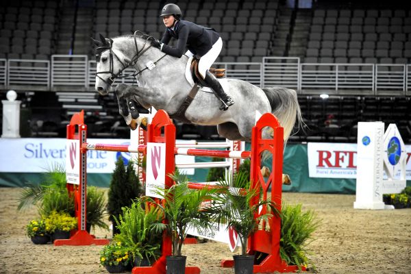 Hunter Holloway and VDL Bravo S captured the $15,000 High Junior/Amateur-Owner Jumper Classic during the International Omaha Horse Show. © Lili Weik Photography