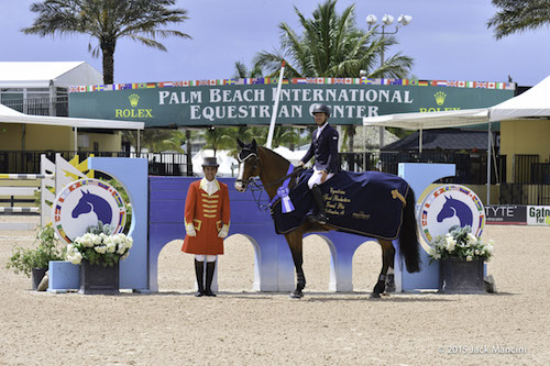 Kent Farrington and Belle Fleur 38 in their winning presentation with ringmaster Gustavo Murcia © Mancini Photos