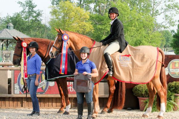 Jennifer Alfano placed first and second overall with Jersey Boy and Miss Lucy, respectively, during the $15,000 USHJA International Hunter Derby at the Kentucky Spring Horse Show. © Lauren Baker