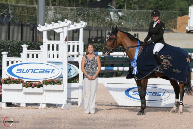 Nina Fagerstrom and Flower in their award presentation with Sponsorship Manager Whitney Stahl. © Sportfot