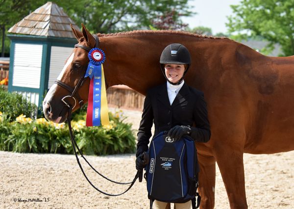 Emma Kurtz and Frederick were awarded the Junior/Amateur-Owner Hunter Grand Championship. © McMiller