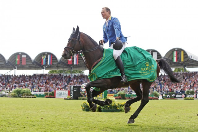 Christian Ahlmann competing in the Rolex Grand Prix Aachen 2014. © Rolex Grand Slam / Andreas Steindl