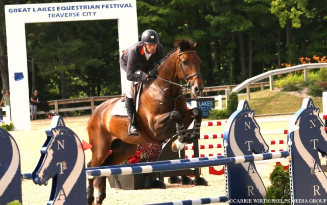 Ryan Genn and Cookie Monster. © Carrie Wirth/Phelps Media Group