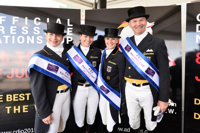 Team Germany stamped their authority all over the fourth leg of the FEI Nations Cup™ Dressage 2015 pilot series when coming out on top at CDIO Hagen, Germany today. Pictured (L to R): Isabell Werth, Kristina Broring-Sprehe, Jessica von Bredow-Werndl and Hubertus Schmidt. © FEI/Karl-Heinz Freiler