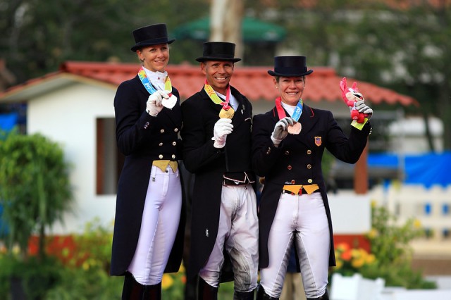 American riders claimed team gold and all the individual medals in Dressage at the 2011 Pan-American Games in Guadalajara, Mexico. Pictured at the individual medal prize-giving (L to R) Heather Blitz (silver), Steffen Peters (gold) and Marisa Festerling (bronze) © FEI/Stockimageservices.com