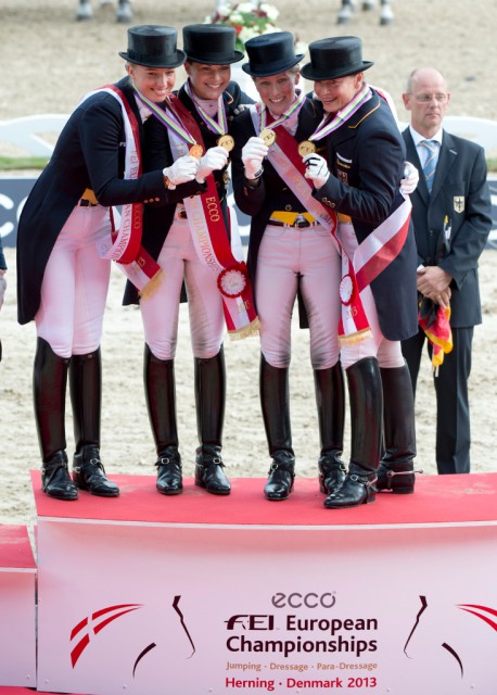 The German gold medal winning team,on the podium for the dressage medal ceremony