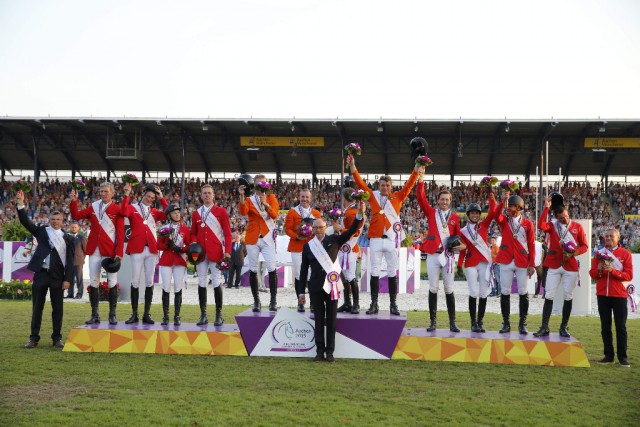 The podium of the team medalists in show jumping at Aachen. © Stefano Grasso