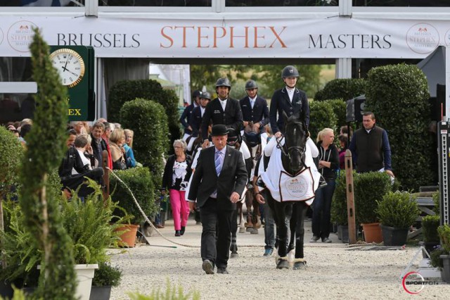 Young gun Lucy Davis leads the world's best riders to the price giving of the Rolex Grand Prix at Brussels Stephex Masters 2015. © Sportfot