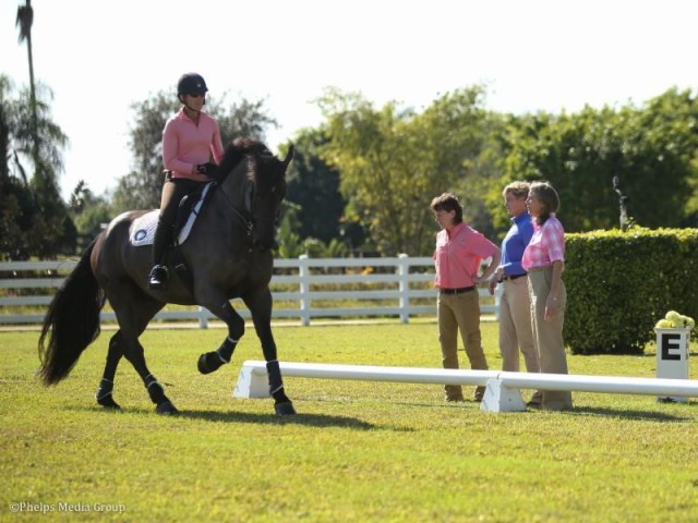 Drs. Sheila Schils, Suzan Oakley and Anne Moretta observe a client at work.© Phelps Media Group