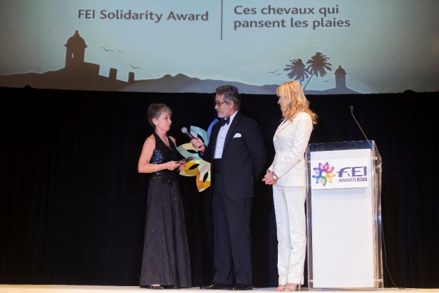 FEI Solidarity - Les Chevaux qui pansent les plaies (Horses that heal wounds) (HAI),Puerto Rican actor and celebrated radio host Braulio Castillo Jr served as master of ceremonies,Hollywood actress and Chair of the Jury for the FEI Awards 2015, Bo Derek,Hollywood actress and Chair of the Jury for the FEI Awards 2015. © FEI/Richard Juilliart