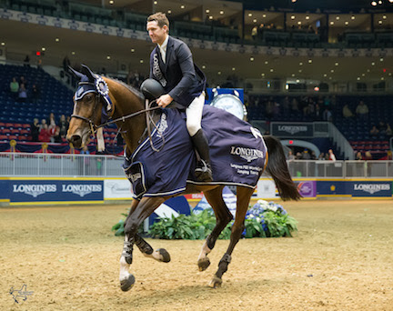 Mclain Ward and HH Azur, owned by Double H Farm, enjoy their victory gallop after winning the $132,000 Longines FEI World Cup™ Jumping Toronto on Wenesday, November 11. © Ben Radvanyi Photography www.benradvanyi.com