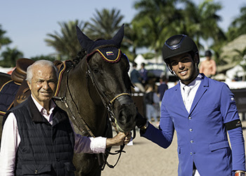 Emanuel Andrade, 19, of Venezuela celebrated his win on opening week with trainer Nelson Pessoa at the Winter Equestrian Festival in Wellington, FL. Photo © Starting Gate Communications
