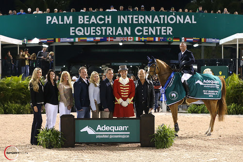 Todd Minikus and Bablou 41 in their winning presentation with (left to right) Audrey Bolte, Associate Brand Manager for Luitpold Animal Health, Caroline Hogan, Kathy Serio, Senior Territory Manager for Luitpold Animal Health, Mark Bellissimo, Katherine Bellissimo, Allyn Mann, Director, Luitpold Animal Health, ringmaster Christian Craig, and owner Enrique Cadena. © Sportfot