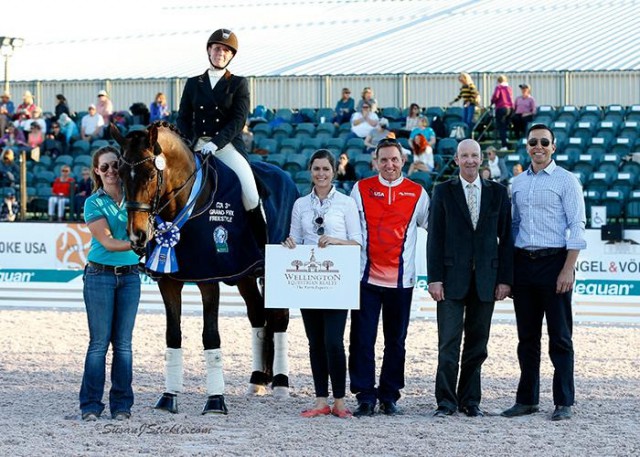 Beatrice Marienau and Stefano 8 in their presentation ceremony with Cora Causemann of AGDF, Allyn Mann of Adequan®, judge Eddy de Wolff van Westrrod, and Rob Desino of Wellington Equestrian Realty. © Susan J. Stickle