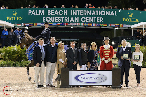 McLain Ward and HH Azur in their winning presentation with Jim Wolf; Equestrian Sport Productions CEO Mark Bellissimo; Wellington Equestrian Partners principal Katherine Bellissimo; Tom, Lauren and Jeannie Tisbo of Suncast®; ringmaster Christian Craig; Double H Farm's owner Hunter Harrison; and Elizabeth Grant, National Events Associate, Rolex Watch U.S.A. © Sportfot