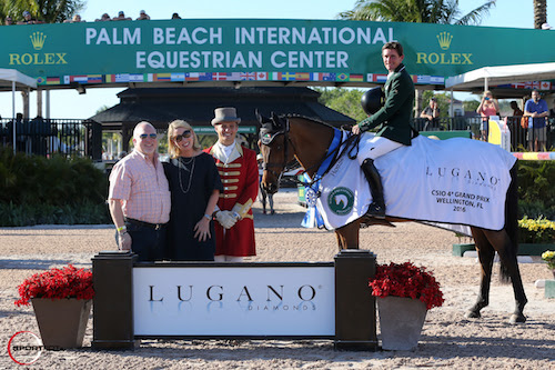 Darragh Kenny and Red Star d'Argent in their winning presentation with Stuart Winston, Vice President of Sales, Lugano Diamonds; Susan Franklin, Vice President of Marketing, Lugano Diamonds; and ringmaster Christian Craig. © Sportfot