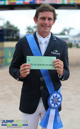 Darragh Kenny of Ireland shows off his $3,000 bonus from SSG Gloves after his win. © Jump Media