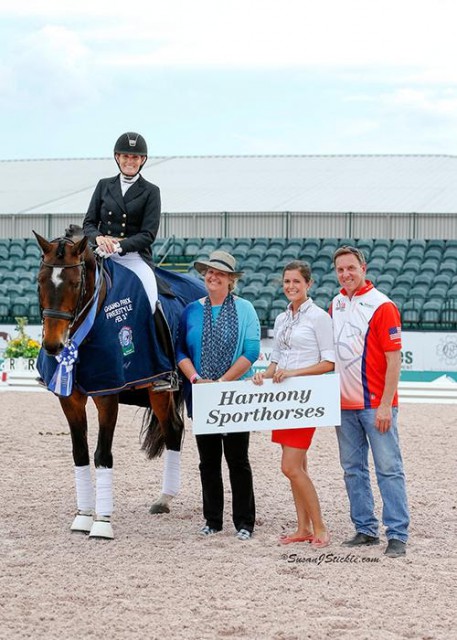 Ashley Holzer and Breaking Dawn in their presentation ceremony with judge Kristi Wysocki (USA), Cora Causemann of AGDF, and Allyn Mann of Adequan®. © Susan J. Stickle