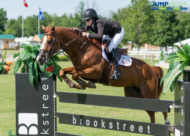Elizabeth Bates of Toronto, ON, and Wildfire won the $35,000 Brookstreet Grand Prix at the 2015 Ottawa International Horse Show at Wesley Clover Parks. © Jump Media