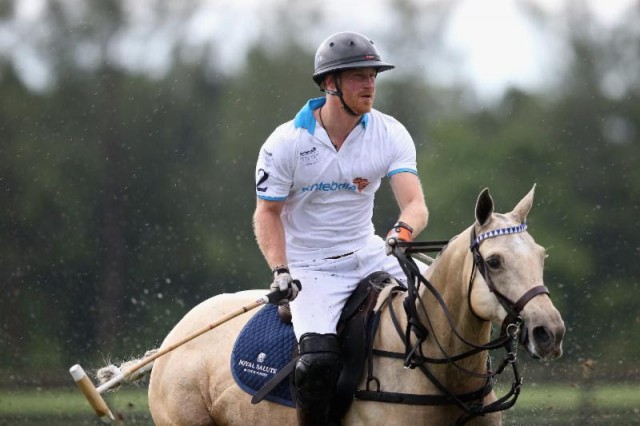 Prince Harry looking dapper on a palomino pony. © Getty Images