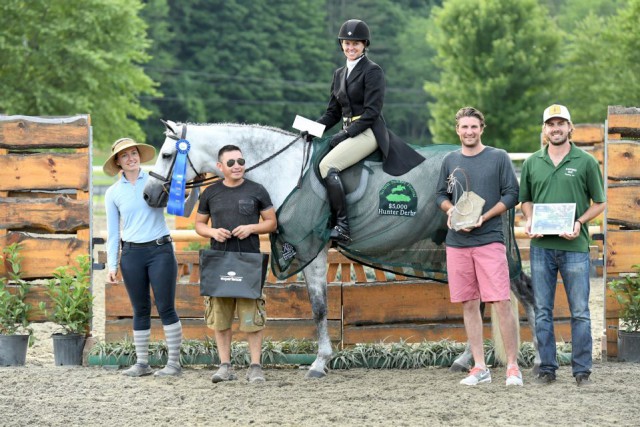 ennifer Bauersachs and Cleaveland are honored as winners of the $5,000 3'3” NEHJA Hunter Derby, presented by Eastern Hay, by Dan and Garrett Johnson of Eastern Hay, along with Bauersachs' barn manager, Jordan Fedrizzi and groom, Mario Marquez. © Andrew Ryback Photography