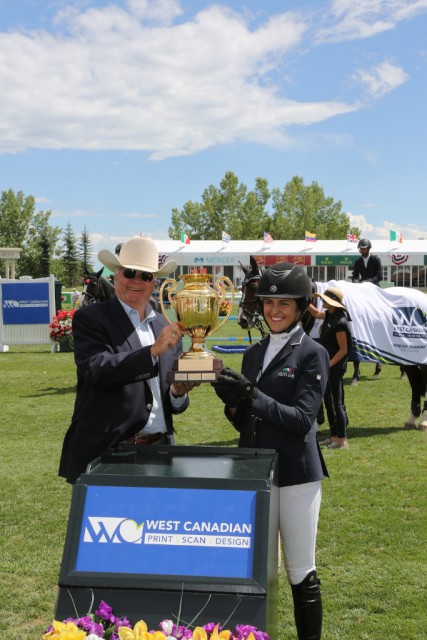  Mckayla Langmeier in her winning presentation with George Brookman, CEO West Canadian. © Spruce Meadows Media Services