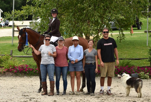Alexandra Pielet aboard Helene VE is presented as the winner of the $10,000 High Junior/Amateur-Owner Jumper Classic by Michelle Barber of Team Barber (first from left), along with her team at Findley's Ridge. © Andrew Ryback Photography