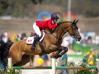 Amy Millar of Perth, ON, jumped clear for Canada in her Olympic debut riding Heros, owned by AMMO Investments. © Arnd Bronkhorst Photography