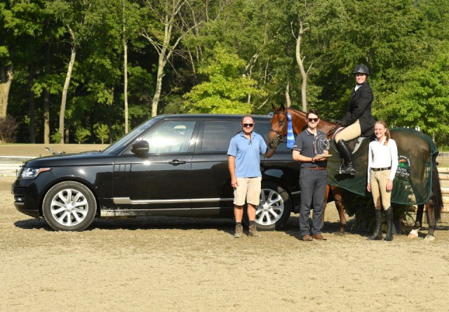 Sarah Barge aboard Danturano, pictured with her fiancé Anthony Field, Land Rover Experience representative Sebastien Dutton, and owner Sydney Degrazia, is presented as the winner of the $15,000 3'3” NEHJA Hunter Derby. © Andrew Ryback Photography