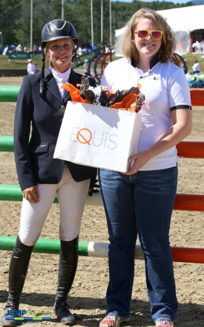 Tracy Fenney is presented with the Equis Best Presented Horse Award from Lauren Kenney of Equis Boutique after impressing the ground jury at HITS Saugerties with MTM Reve du Paradis. © Jump Media Photography