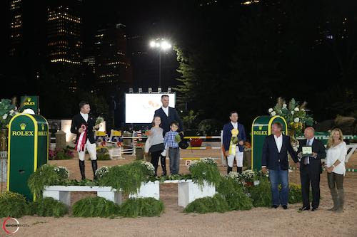 Jimmy Torano is joined by daughter Natalia and son JJ, along with second place finisher Sharn Wordley and third place rider Conor Swail, Mark Bellissimo of International Equestrian Group, Stewart Wicht, President and CEO of Rolex Watch U.S.A., and Katherine Bellissimo. © Sportfot