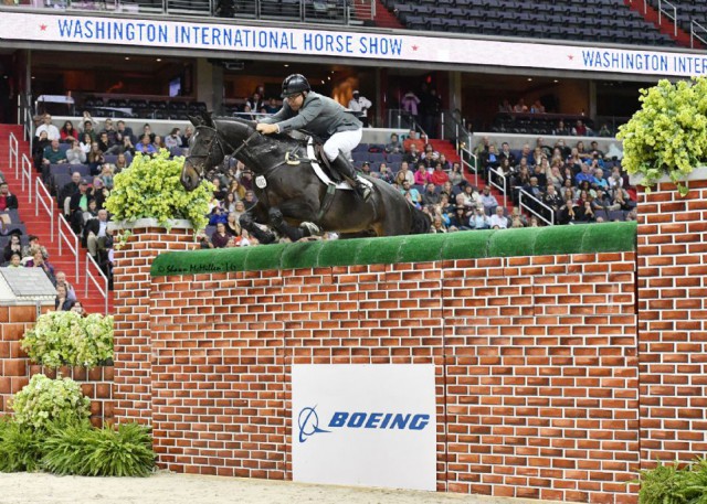  Aaron Vale and Finou 4 clear the Puissance wall at 7 feet. © Shawn McMillen