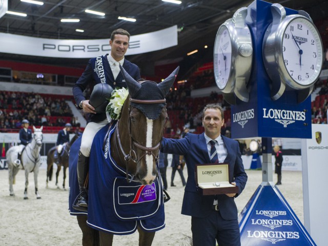 Romain Duguet and Quorida de Treho won the Longines FEI World Cup™ Jumping Western European League leg at Helsinki (FIN) for the second year in a row today. The Swiss rider is pictured being presented with his winner’s watch by Casper Gebeke, Longines Brand Manager Finland. © FEI/Satu Pirinen