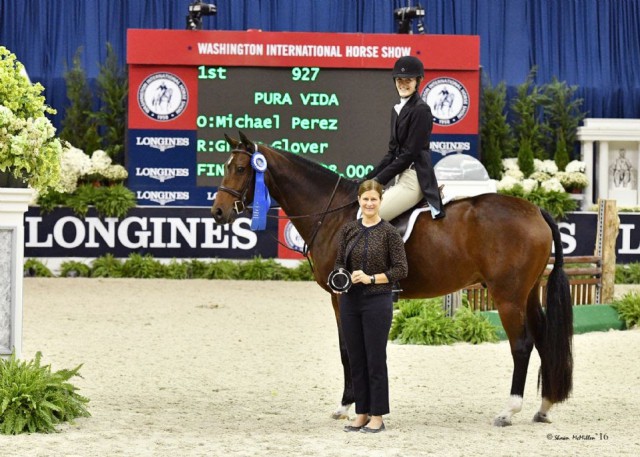 Grace Glover and Pura Vida in their winning presentation with WIHS Executive Director Bridget Love Meehan. © Shawn McMillen Photography