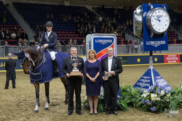 McLain Ward is presented as the winner of the $130,270 Longines FEI World Cup™ Jumping Toronto. From left to right: Charlie Johnstone, CEO of The Royal Agricultural Winter Fair, Iain Gilmour, Chairman of the Royal Horse Show, and Connie Sawyer, Manager of the Longines FEI World Cup™ Jumping North American League. © Radvanyi Photography