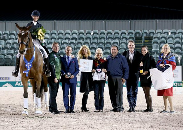 Laura Graves and Verdades are joined in their winning presentation by Allyn Mann of Adequan®, judge Lee Tubman, representatives from the U.S. PRE Association, Cora Causemann of AGDF, and FEI Chief Steward Elisabeth Williams. ©SusanJStickle