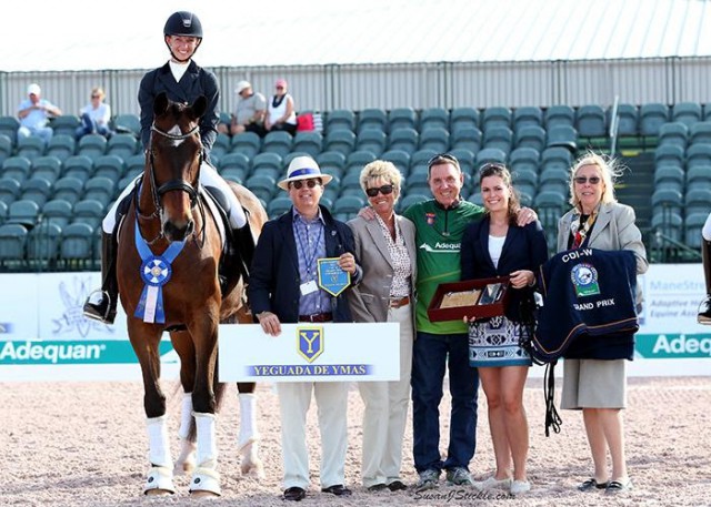 Laura Graves and Verdades in their presentation ceremony with Javier Bacariza of Yeguada de Ymas, judge Ulrike Nivelle (GER), Allyn Mann of Adequan®, Cora Causemann of AGDF, and Chief FEI Steward Elizabeth Williams. © Susan J Stickle