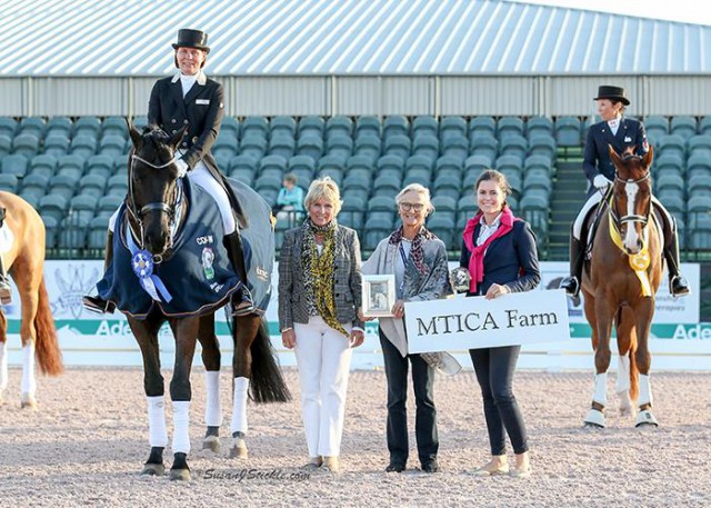 Suzan Pape and Harmony's Don Noblesse in their presentation ceremony with judge Katrina Wuest (GER), Janne Rumbough of MTICA Farm, and Cora Causemann of AGDF. © Susan J Stickle