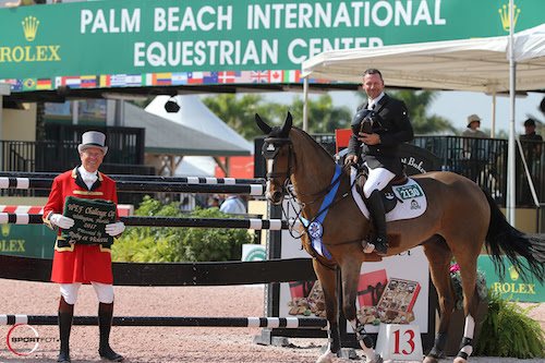 Eric Lamaze and Fine Lady 5 in their winning presentation with ringmaster Steve Rector. © Sportfot