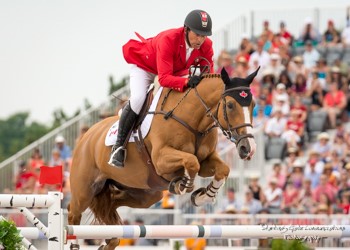 Yann Candele and Showgirl, owned by The Watermark Group, represented Canada at the 2014 Alltech FEI World Equestrian Games in Normandy, France, and led Canada to a team gold medal at the 2015 Pan American Games in front of a home crowd in Toronto, Canada. © Starting Gate Communications