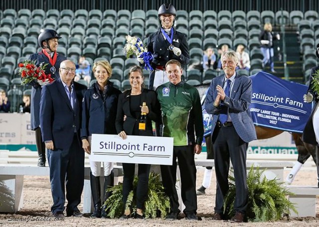 The FEI Grand Prix Freestyle CDIO 3* podium with winner Megan Lane, Equestrian Sport Productions President Michael Stone, Tuny Page of Stillpoint Farm, Cora Causemann of AGDF, Allyn Mann of Adequan®, and judge Thomas Lang. © Susan Stickle