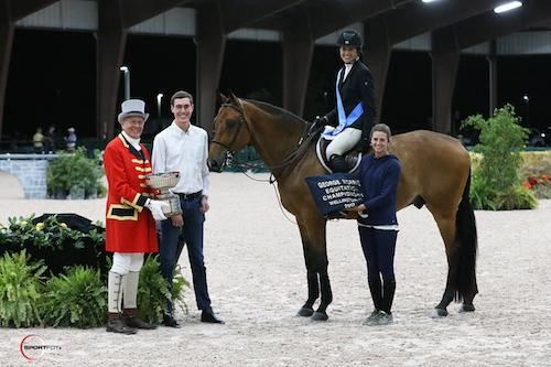 McKayla Langmeier and Calberon B in their winning presentation with ringmaster Steve Rector, 2016 winner T.J. O'Mara, and Carly Sutherland. © Sportfot