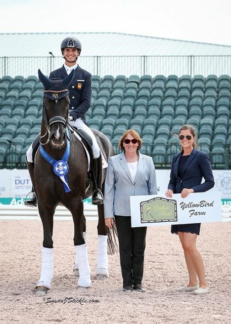 Juan Matute and Dhannie Ymas in their winning presentation with judge Evi Eisenhardt and Cora Causemann of AGDF. © Susan Stickle