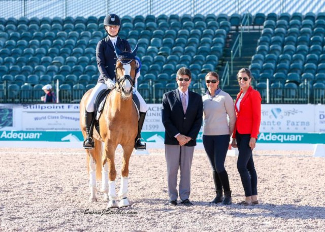Lisa Widmayer and Paso Double in their presentation ceremony with judge Cesar Torrente (COL), Tinne Vilhelmson-Silfven of The Axel Johnson Group, and Cora Causemann of AGDF. © Susan J Stickle