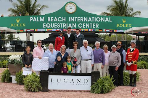 Ali Wolff, Shane Sweetnam, and Conor Swail in their winning presentation with Ariel Bluman, Craig Dickmann, Director of Equestrian,and Stuart Winston, Chief Marketing Officer, Executive Director of Retail, Lugano Diamonds; Lisa Lourie of Spy Coast Farms; Olivia, Lucy, and Collin Sweetnam; Tina and Bill Justice; Jerry and Maria Sweetnam; Noel Phelan; Michael Stone, President of Equestrian Sport Productions; and ringmaster Steve Rector. © Sportfot