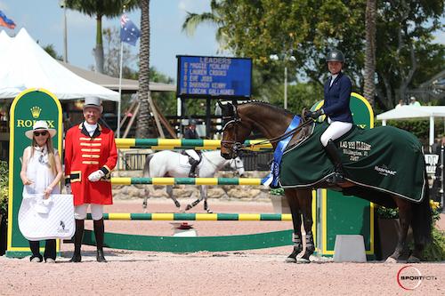 Hilary McNerney and Z Acodate DDL in their presentation with Laura Fetterman of Champion Equine Insurance and ringmaster Steve Rector. © Sportfot