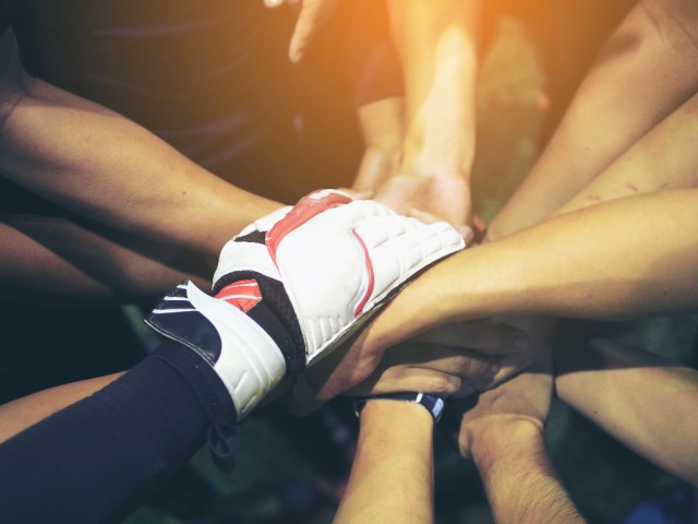 Auch wenn du eine Einzelsportart ausübst ist dein (Betreuer-)Team entscheidend! © Shutterstock / Kornvikan